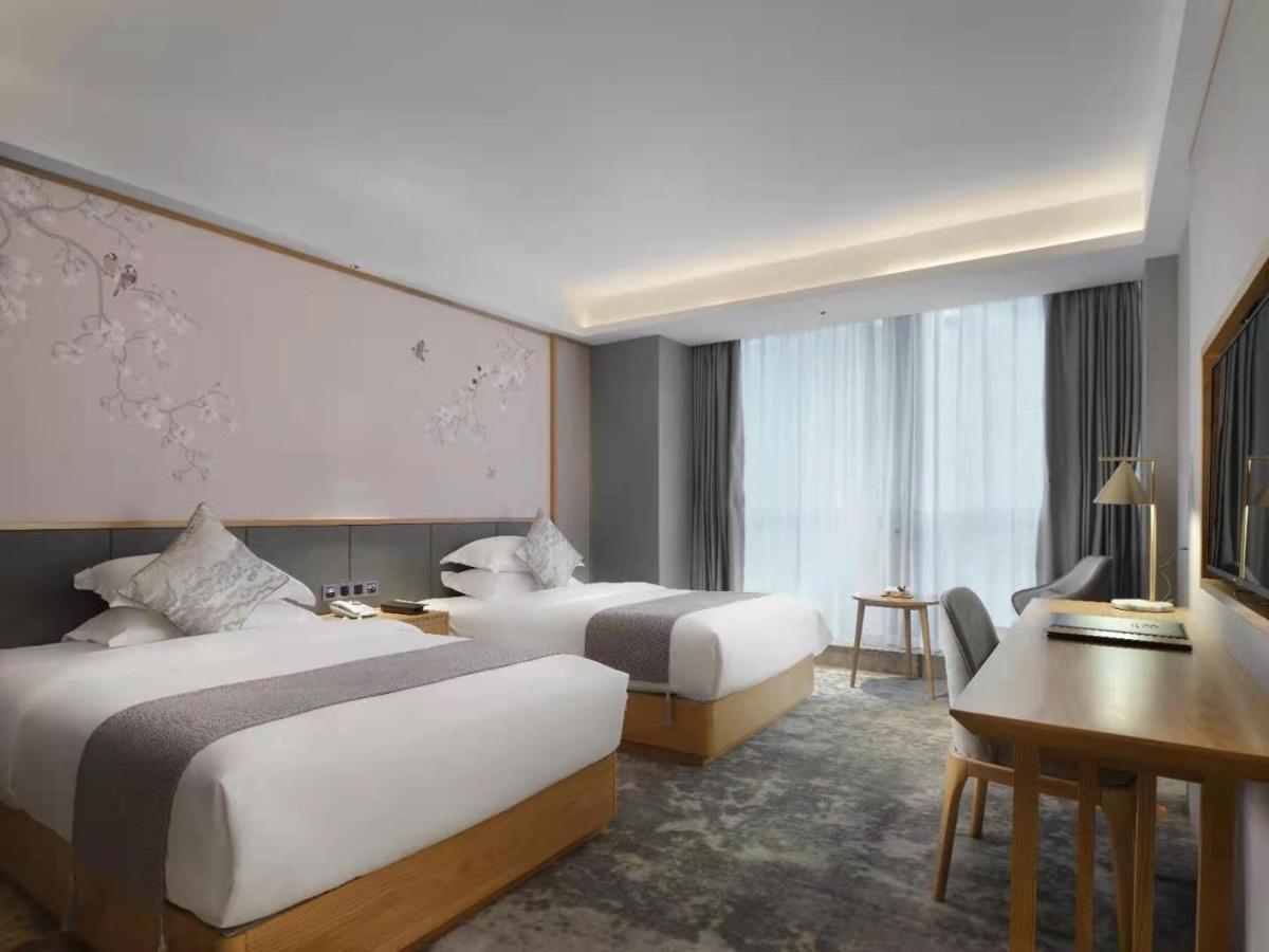 Baian Art Hotel Luzhou Exterior photo